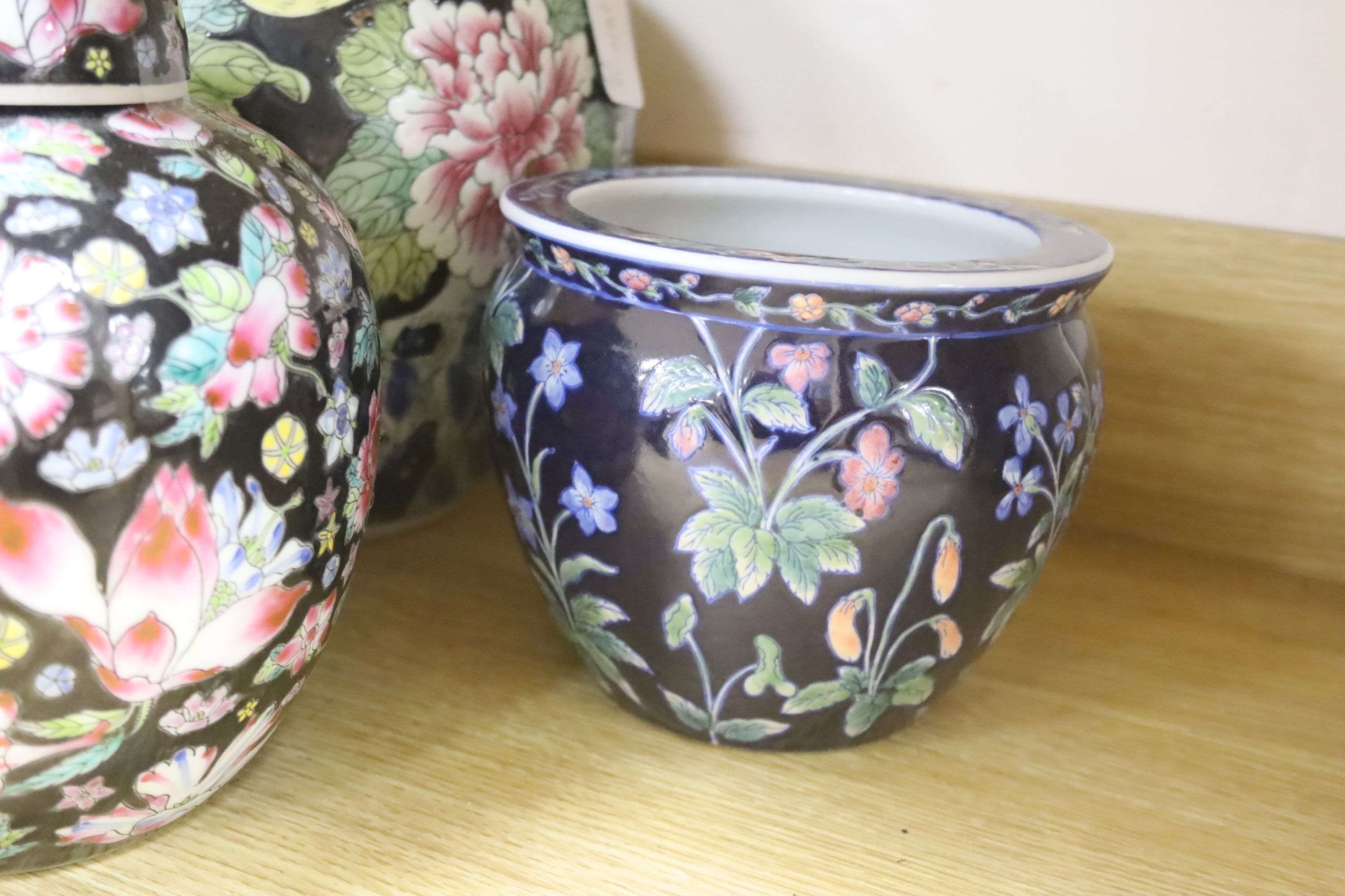 Six Chinese famille rose jars and a jardiniere